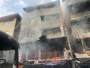 A fire outbreak occurred on Wednesday at the intersection of Nnamdi Azikiwe and Docemo in the Idumota area of Lagos Island, Lagos State, resulting in the destruction of three buildings