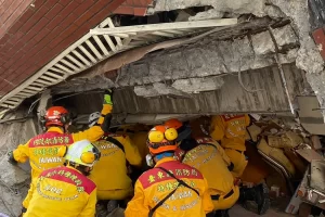 Rescue efforts are under way in Taiwan after a 7.4 magnitude earthquake struck the island's eastern coast, killing at least nine and injuring more than 800.