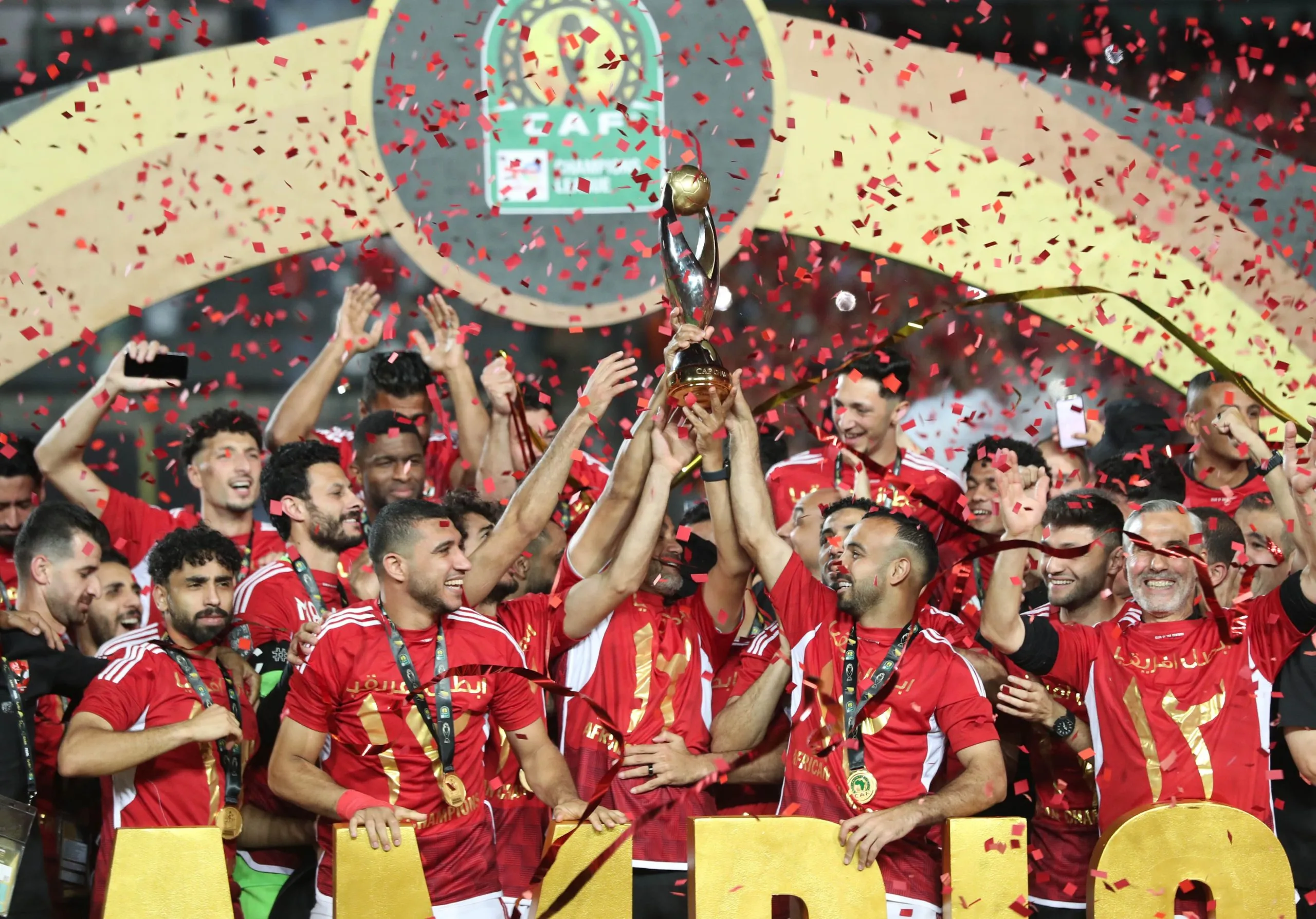 An early own goal from Roger Aholou secured a 1-0 victory for Al Ahly of Egypt against Tunisian side Esperance, earning them a record-extending 12th CAF Champions League title.