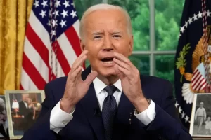 US President Joe Biden has called for the "temperature of politics" to be lowered after the assassination attempt on Donald Trump