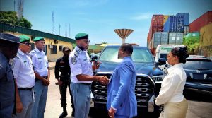 Customs officials during the handing over